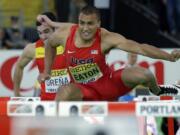 United States&#039; Ashton Eaton competes next to Spain&#039;s Jorge Ure?a, left, in a heat of the men&#039;s 60-meter hurdles of the heptathlon during the World Indoor Athletics Championships, Saturday, March 19, 2016, in Portland, Ore. Eaton won the heat.