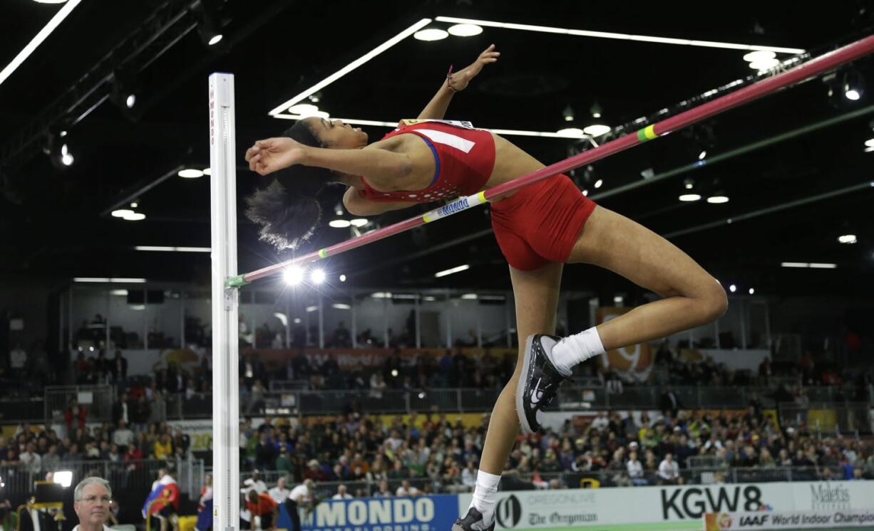 United States' Vashti Cunningham clears the bar during women's high jump final during the World Indoor Athletics Championships, Sunday, March 20, 2016, in Portland, Ore. Cunningham won the event.