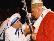 Pope John Paul II greets Mother Teresa in St. Peter&#039;s Basilica at the Vatican on June 29, 1997.