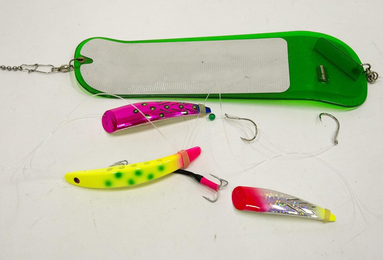 From top, an 11-inch Pro-Troll flasher, a Brad's Super Bait Cut Plug, a Brad's Super Bait and a Brad's Super Bait mini Cut Plug (AMANDA COWAN/The Columban)