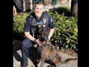 Officer Christopher Douville and Doc both recently join the Vancouver Police Office K-9 Unit. Doc, a 2-year-old Dutch Shepherd, is named in honor of Douville's father.