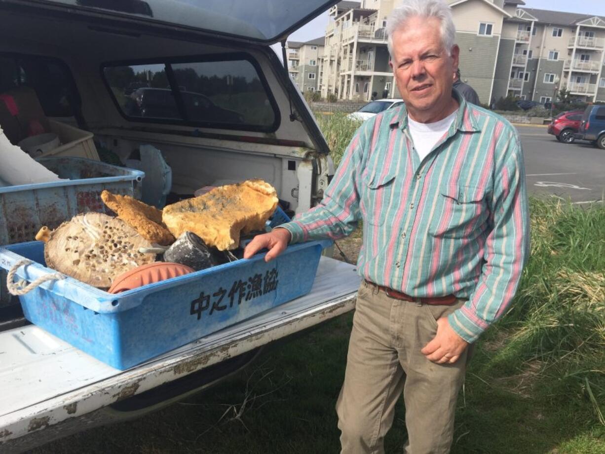 Russ Lewis, a Southwest Washington retiree, participates in frequent cleanups off a 7-mile-long stretch of the Long Beach coastline. Since starting in June 2012, he has logged more than 700 cleanup days.