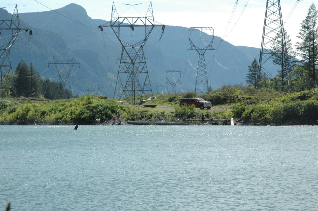 Ten-acre Kidney Lake in North Bonneville will be sold by sealed bid on May 26. Several anglers were fishing on Sunday, six days before Saturday's opening day.