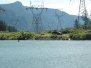 Ten-acre Kidney Lake in North Bonneville will be sold by sealed bid on May 26. Several anglers were fishing on Sunday, six days before Saturday's opening day.