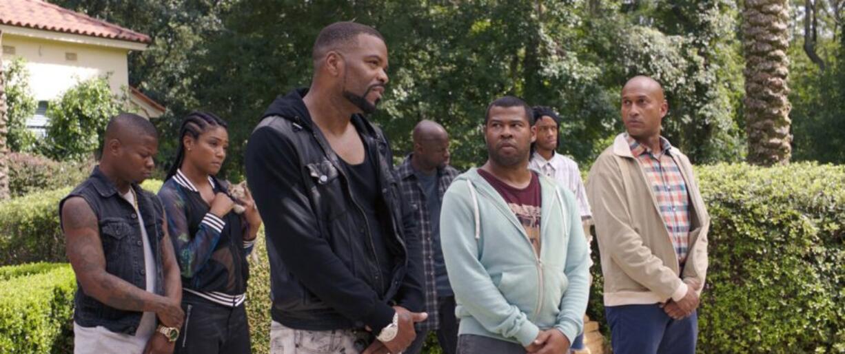 Method Man, from left, Keegan-Michael Key, Jordan Peele and Tiffany Haddish star in in &quot;Keanu.&quot; (Warner Bros.