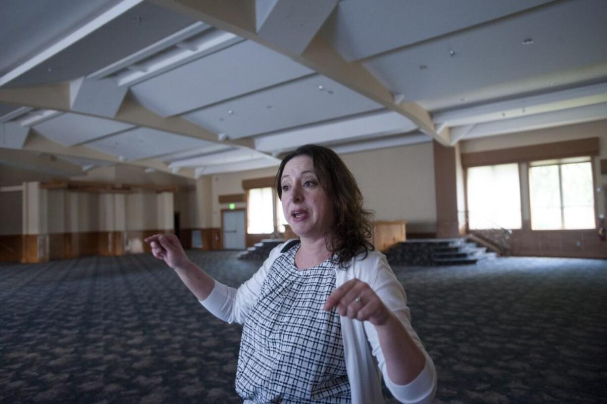 Annette Klinefelter, executive director of Daybreak Youth Services, in a former church that her organization plans to convert into a rehabilitation center for teens in Brush Prairie.