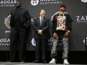 Retired NBA player Shaquille O'Neal, left, Michigan State head coach Tom Izzo, center, and retired NBA player Allen Iverson laugh on stage during the Naismith Memorial Basketball Hall of Fame class of 2016 announcement, Monday, April 4, 2016, in Houston, Texas.