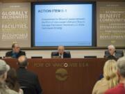 Port Commissioners Eric LaBrant, from left, Jerry Oliver and Brian Wolfe debate in front of a packed crowd April 15 at the Port of Vancouver.