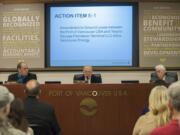 Port Commissioners Eric LaBrant, from left, Jerry Oliver and Brian Wolfe debate in front of a packed crowd April 15 at the Port of Vancouver.