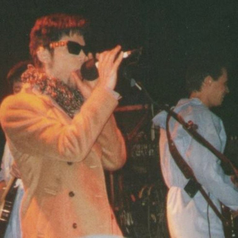 Prince, then known as The Artist Formerly Known as Prince, performs &quot;Raspberry Beret&quot; with 1980s cover band The Cheesebrokers on Jan. 18, 1997, in Birmingham, Ala. At right, Michael Green, now a Vancouver defense attorney, plays bass.