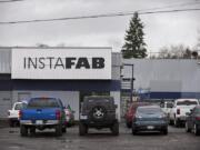 Cars are parked outside Instafab on a Monday morning in February in Vancouver.