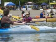 More than 100 boats were available for people to try at the 21st annual Spring Paddle Festival at Vancouver Lake in 2013.