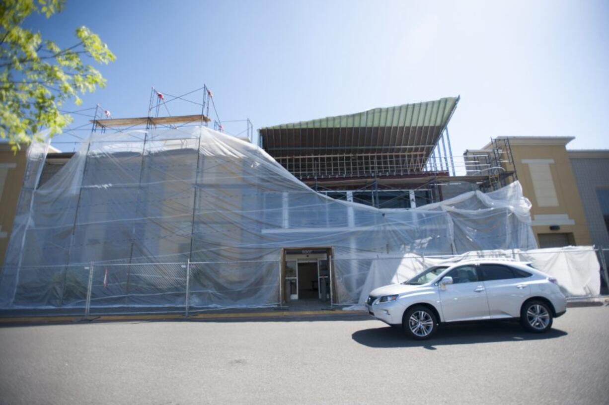 The exterior facade of a new Craft Warehouse in Hazel Dell will remove the well-recognized shape and colors of the building&#039;s former tenant, a Best Buy electronics store. The Craft Warehouse is scheduled to open this summer.