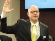 Battle Ground: City Manager Jeff Swanson takes his oath of office.