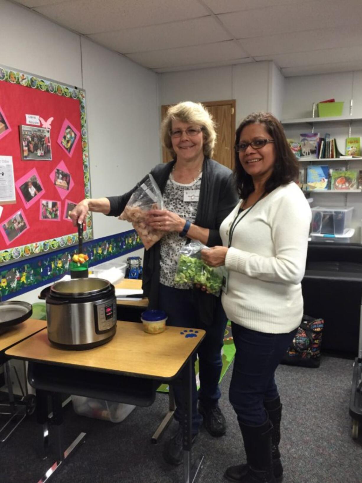 Ellsworth Springs: Nutrition educator Marty Fields, from left, partnered with Maria Dorshkind, outreach coordinator at the Ellsworth Elementary Fresh Food Pantry, on March 22 to provide a salmon chowder tasting.