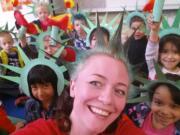 Shae Cecka, art discovery coordinator at Endeavour Elementary School, doubled up on the school&#039;s monthly art theme, &quot;Liberty Enlightening the World,&quot; with Spirit Week&#039;s &quot;crazy hair day.&quot; Students fashioned their own crowns and torches during art class.