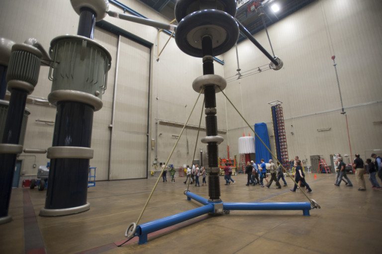 Participants walk through a lab where high voltage experiments are conducted during a tour part of the &quot;take your kid to work day,&quot; at the Bonneville Power Administration&#039;s Ross Complex in Vancouver Thursday April 28, 2016.