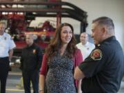 U.S. Rep. Jaime Herrera Beutler, R-Camas, chats with Vancouver Fire Chief Joe Molina on April 22 at the Vancouver Fire Department station in northeast Vancouver.