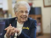 Wearing red, white and blue star-spangled earrings and an embroidered Boeing badge, Janice Rickard, 92, speaks from her Vancouver home on Tuesday about working as a Rosie the Riveter for Boeing during World War II.