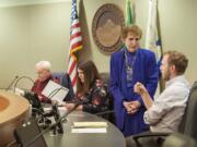 Salary Review Commission members Barry Hemphill, from left, Magan Reed, MarCine Miles and Thomas Hackett gather before the meeting Friday morning, April 15, 2016 at City Hall.