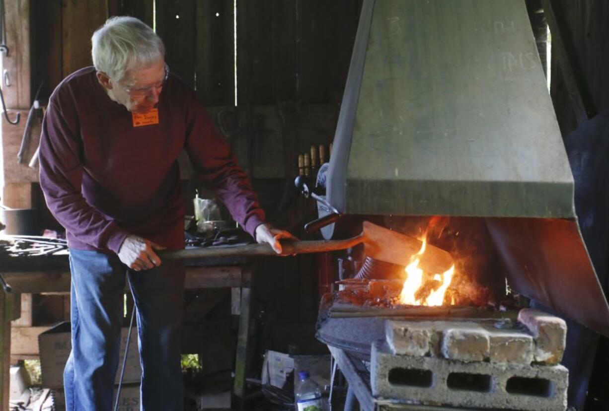 Tom Dwyer demonstrates blacksmith skills at the Pomeroy Farm Country Life Fair. Dwyer also volunteers in the blacksmith shop at Fort Vancouver National Historic Site.