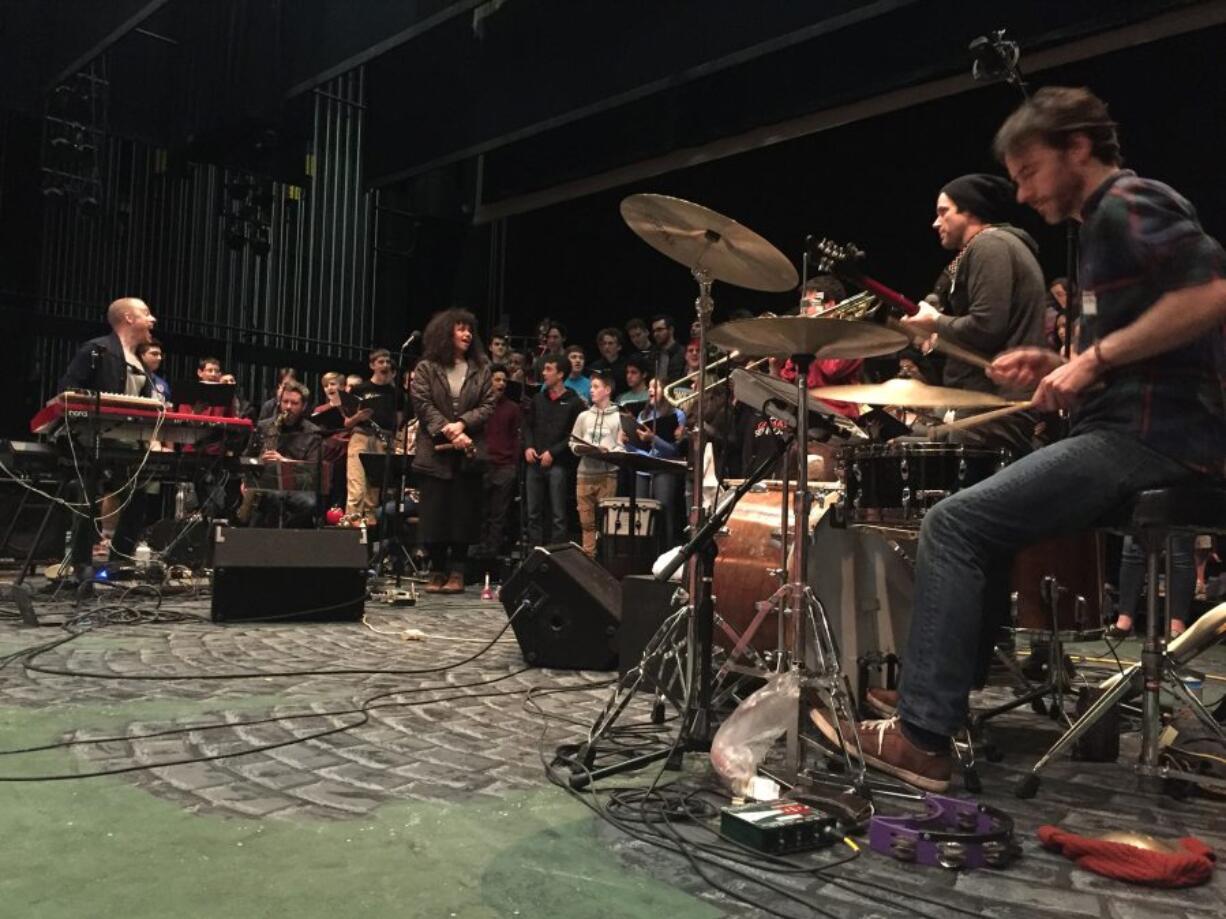 Behind the red electric piano at left is Luke Wyland directing the Camas High School choir as his own band, AU, grooves along. At center is guest singer Holland Andrews, also known as Like a Villain.