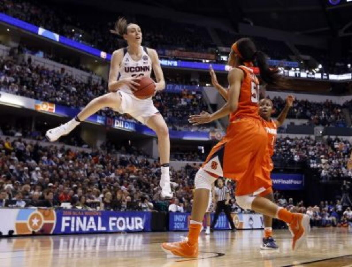 Connecticut&#039;s Breanna Stewart (30) grabs a rebound as Syracuse&#039;s Briana Day (50) watches during the second half of the championship game at the women&#039;s Final Four in the NCAA college basketball tournament Tuesday, April 5, 2016, in Indianapolis.