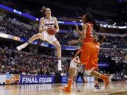 Connecticut&#039;s Breanna Stewart (30) grabs a rebound as Syracuse&#039;s Briana Day (50) watches during the second half of the championship game at the women&#039;s Final Four in the NCAA college basketball tournament Tuesday, April 5, 2016, in Indianapolis.