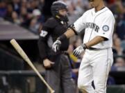 Seattle Mariners&#039; Norichika Aoki tosses aside his bat after striking out against the Oakland Athletics to end the fifth inning in a baseball game Saturday, April 9, 2016, in Seattle.