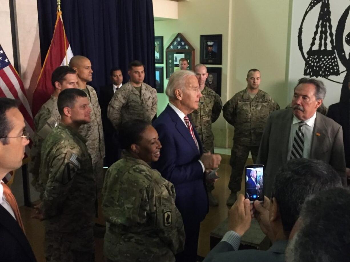 Vice President Joe Biden meets with U.S. diplomatic and military personnel serving in Iraq on Thursday at the U.S. Embassy in Baghdad.