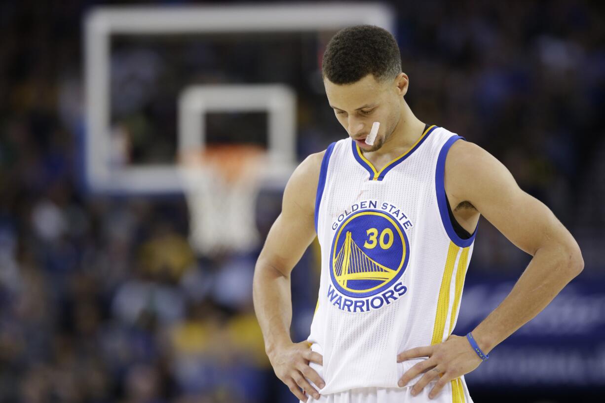 Golden State Warriors' Stephen Curry (30) during an NBA basketball game against the Boston Celtics Friday, April 1, 2016, in Oakland, Calif.