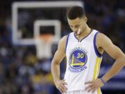 Golden State Warriors' Stephen Curry (30) during an NBA basketball game against the Boston Celtics Friday, April 1, 2016, in Oakland, Calif.