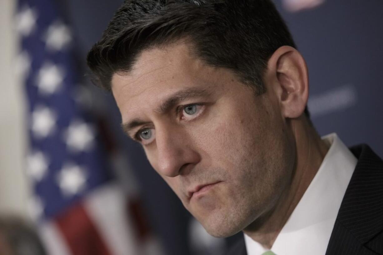 House Speaker Paul Ryan of Wis. pauses during a news conference on Capitol Hill in Washington. Ryan said Thursday that the whole world is watching American politics and he can understand how Middle East allies would be rattled by Republican front-runner Donald Trump?s controversial comments.  (AP Photo/J.