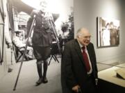 Patrick Hemingway, son of Ernest Hemingway, stands near a 1918 photo of his father in Italy while recovering from war wounds in World War I as he visits the exhibit: &quot;Ernest Hemingway: Between Two Wars&quot; at the John F. Kennedy Presidential Library and Museum in Boston.