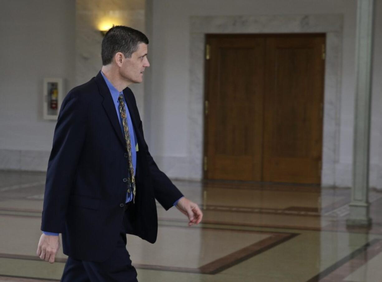 Washington State Auditor Troy Kelley leaves the federal courthouse during a court recess Tuesday in Tacoma. Testimony concluded in Kelley&#039;s five-week fraud trial Tuesday, and U.S. District Judge Ronald Leighton said closing arguments will begin Wednesday following jury instructions. (AP Photo/Ted S.