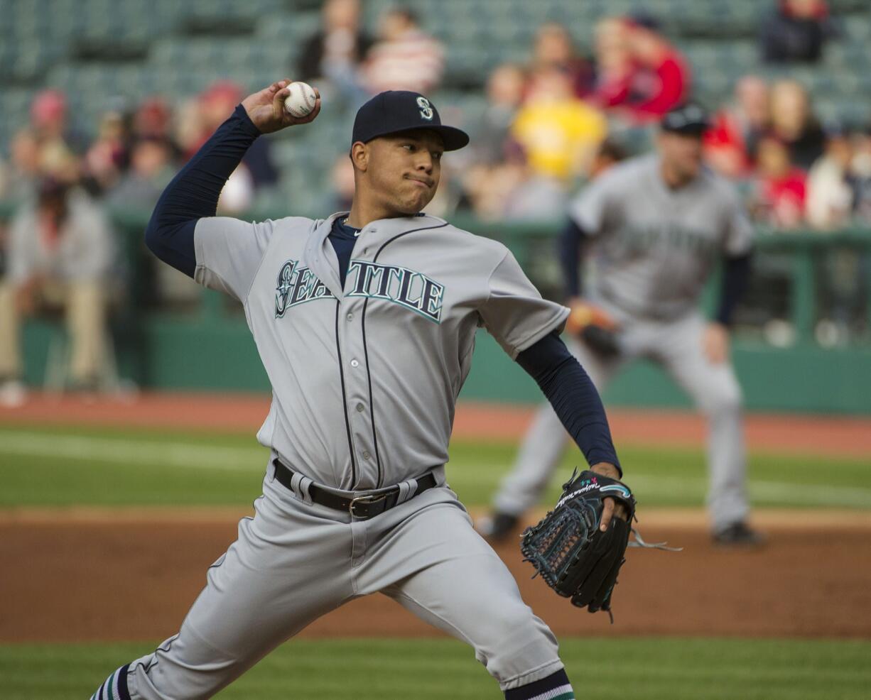 Seattle Mariners pitcher Taijuan Walker delivers to Cleveland Indians Francisco Lindor during the first inning inning of a baseball game, in Cleveland, Wednesday, April 20, 2016.