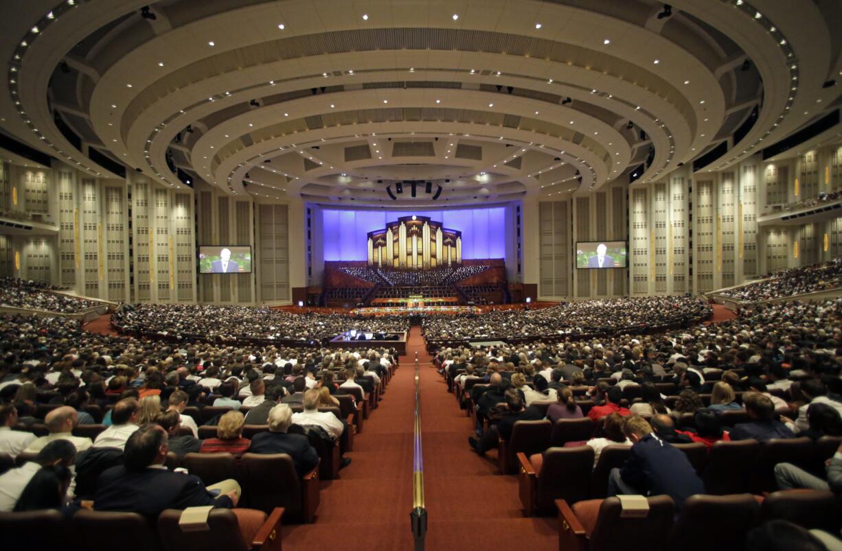 People attend opening session of the two-day Mormon church conference Saturday, April 2, 2016, in Salt Lake City. Mormon leaders are set to deliver guidance to their worldwide membership in a series of speeches this weekend during the religion&#039;s semiannual conference in Salt Lake City. The first session kicks off Saturday morning at a 21,000-seat conference center near the church&#039;s headquarters.