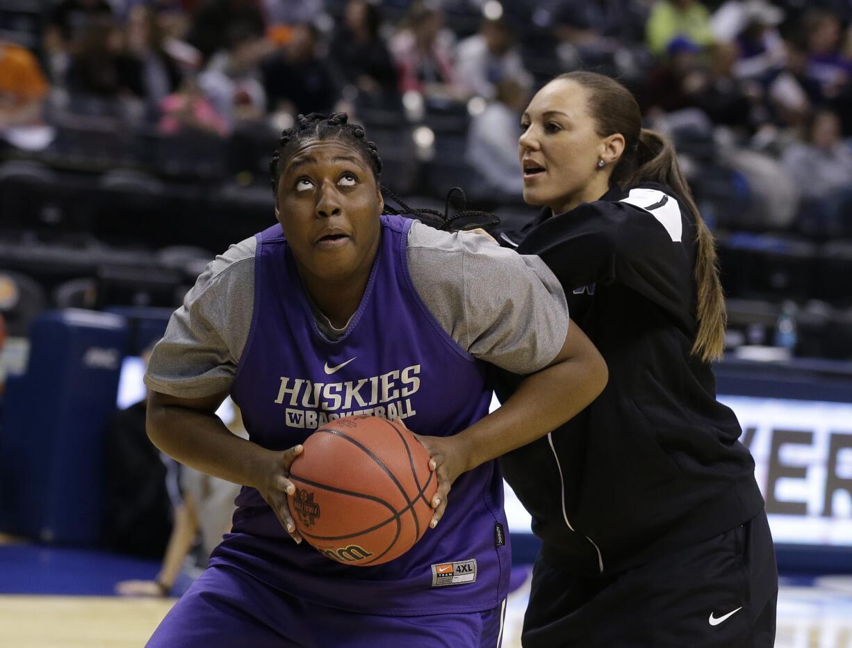 Washington&#039;s Chantel Osahor (0) puts up a shot during college basketball practice for the women&#039;s Final Four in the NCAA Tournament Saturday, April 2, 2016, in Indianapolis.