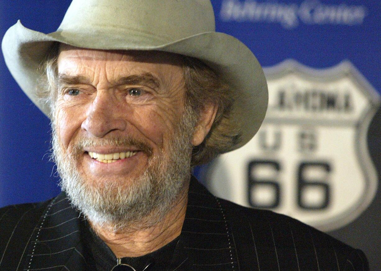 Country music legend Merle Haggard smiles during a 2003 news conference at the Smithsonian's National Museum of American History in Washington where he and his sister Lillian Haggard Hoge donated belongings taken on their family's Dust Bowl-era move from Oklahoma to California on Route 66. Haggard died of pneumonia, Wednesday, April 6, 2016, in Palo Cedro, Calif. He was 79.