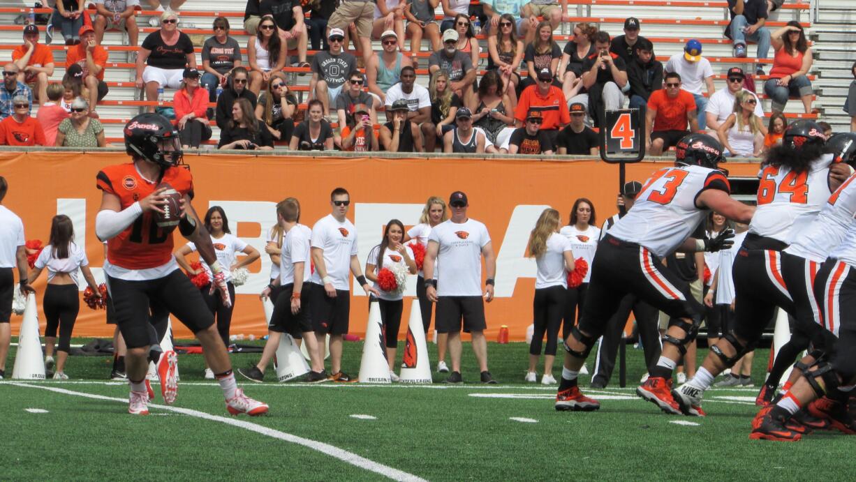 Oregon State quarterback Darell Garretson looks to pass during the Beavers' annual spring game at Reser Stadium in Corvallis, Ore., on Saturday, April 16, 2016. Garretson is a transfer from Utah State about to embark on his first season with the Beavers. (AP Photo/Anne M.