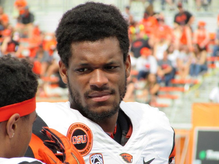 Oregon State receiver Jordan Villamin talks with a teammate at the Oregon State spring game at Reser Stadium in Corvallis, Ore., on Saturday, April 16, 2016. Villamin is the top returning receiver for the Beavers in the coming season. (AP Photo/Anne M.