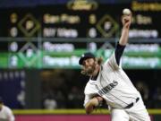 Seattle Mariners starting pitcher Wade Miley throws against the Kansas City Royals in the eighth inning of a baseball game, Saturday, April 30, 2016, in Seattle. Miley threw a five-hitter in his first career shutout to give the Mariners a 6-0 win. (AP Photo/Ted S.