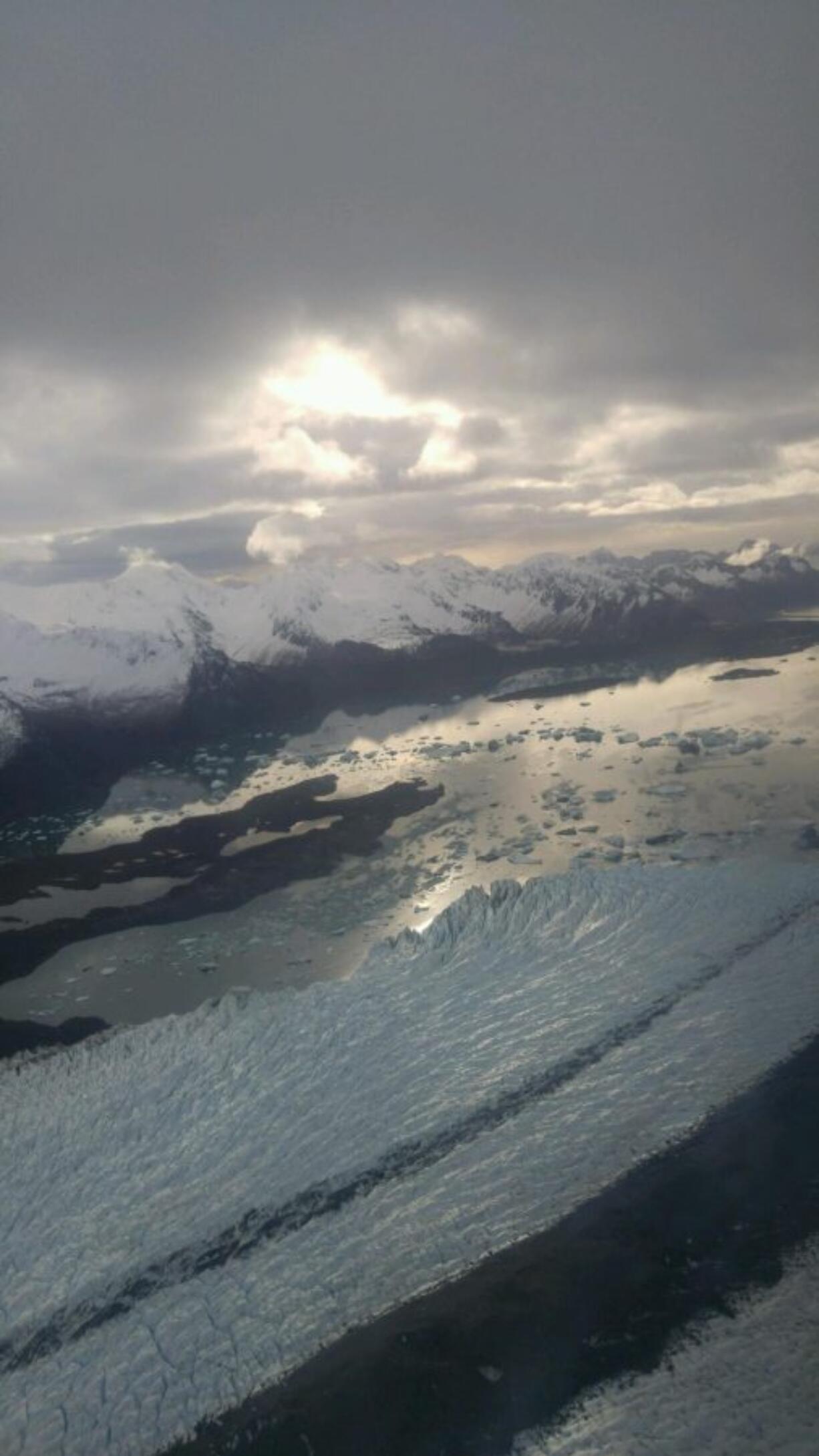 This Tuesday, April 12, 2016, photo provided by the Alaska Air National Guard shows clear weather atop the Harding Ice Field in Alaska. A four-man Alaska Air National Guard rescue team was dropped off on the ice field on Monday, to help rescue skiers, Christopher Hanna and Jennifer Neyman, who were stranded on the glacier and hunkered down in a snow cave. Poor weather prevented a helicopter from landing, and could only drop this team off about 15 miles away. The guard rescue team skied to about 1.7 miles of the two survivors when weather cleared enough for a helicopter to land and take the two people to a hospital.