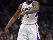 Los Angeles Clippers center DeAndre Jordan complains to referees after scoring during the first half of an NBA basketball game against the Washington Wizards, Sunday, April 3, 2016, in Los Angeles. (AP Photo/Mark J.