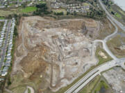 The Columbia Palisades development would turn this rock quarry along 192nd Avenue and Brady Road into a mix of houses, apartments, offices and retail. Plans for the development were submitted to the city on Thursday, and construction could begin next spring if the project is approved.