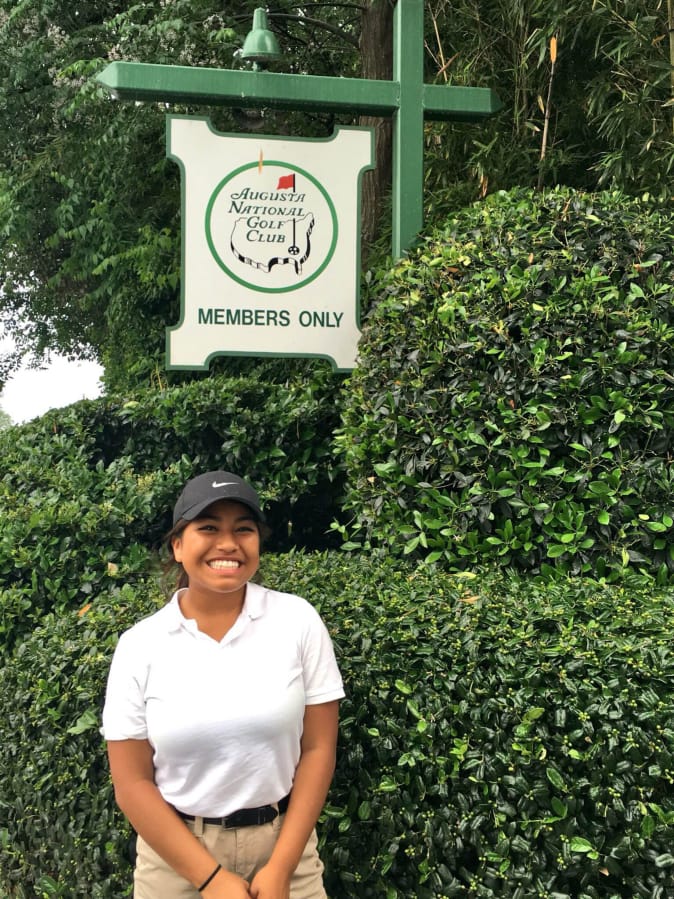 Julieta Rendon-Mendoza, a Union High School golfer, visiting the entrance to Augusta National, home of The Masters golf tournament.