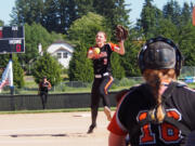 Battle Ground High School pitcher Parker Boyd delivers a strike to a Camas batter in a sequence of photographs Wednesday.