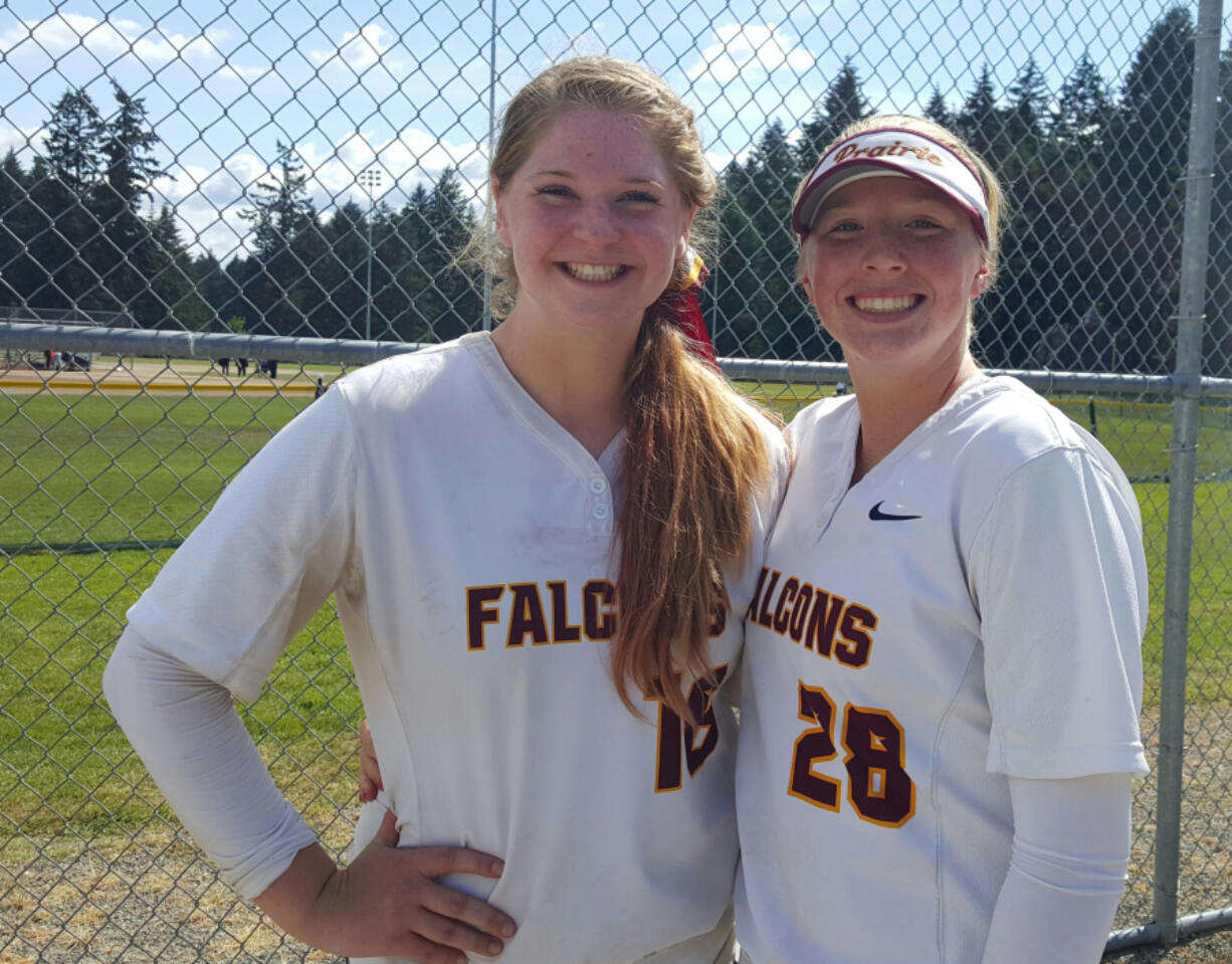 Prairie softball players Bridget Guiney, left, and Kylee Snider after the Falcons qualified for the 3A state tournament with two wins Friday at the 3A bi-district tournament in Spanaway.