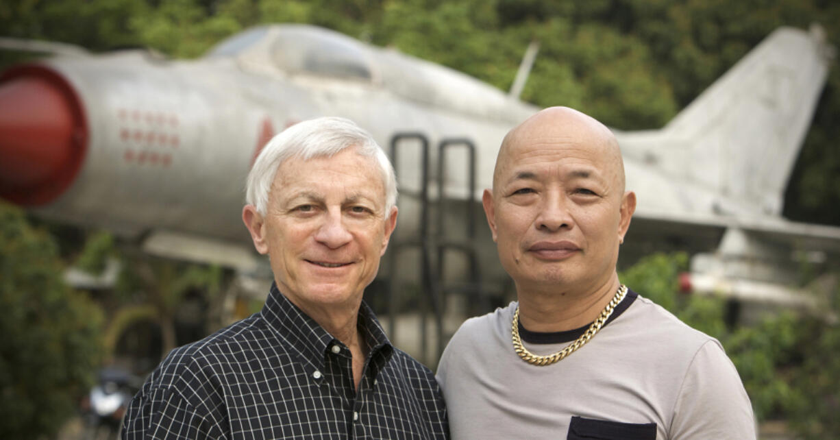 Opposing Vietnam War fighter pilots Dan Cherry, left, and Nguyen Hong My in 2008.