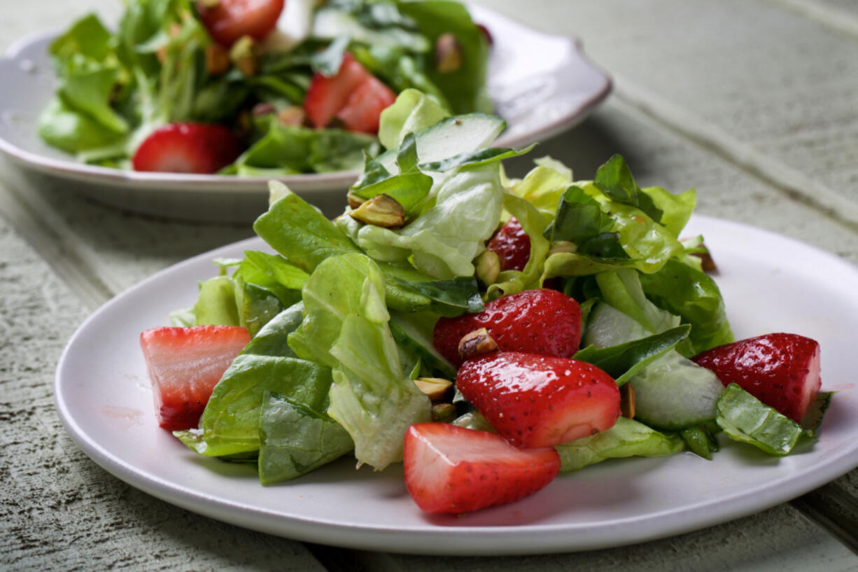 Tender Green Salad With Strawberries, Cucumber, Pistachio and Basil.